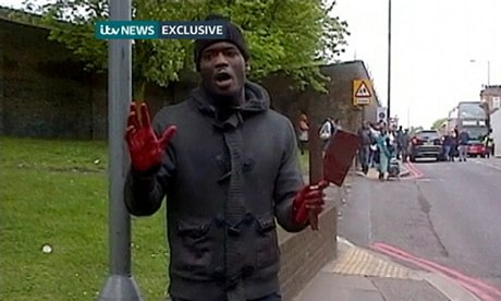 Michael Adebolajo speaks to a witness videoing him on a smartphone after killing Lee Rigby in Woolwich