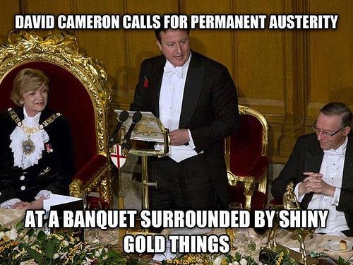 Image of Cameron surrounded by shiny gold things