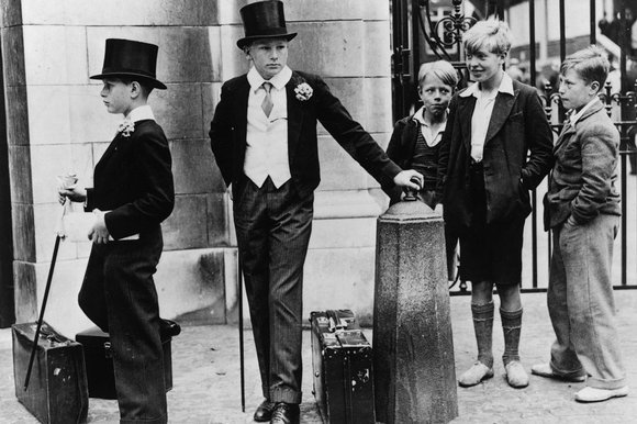 Image of young rich public schoolboys and poor