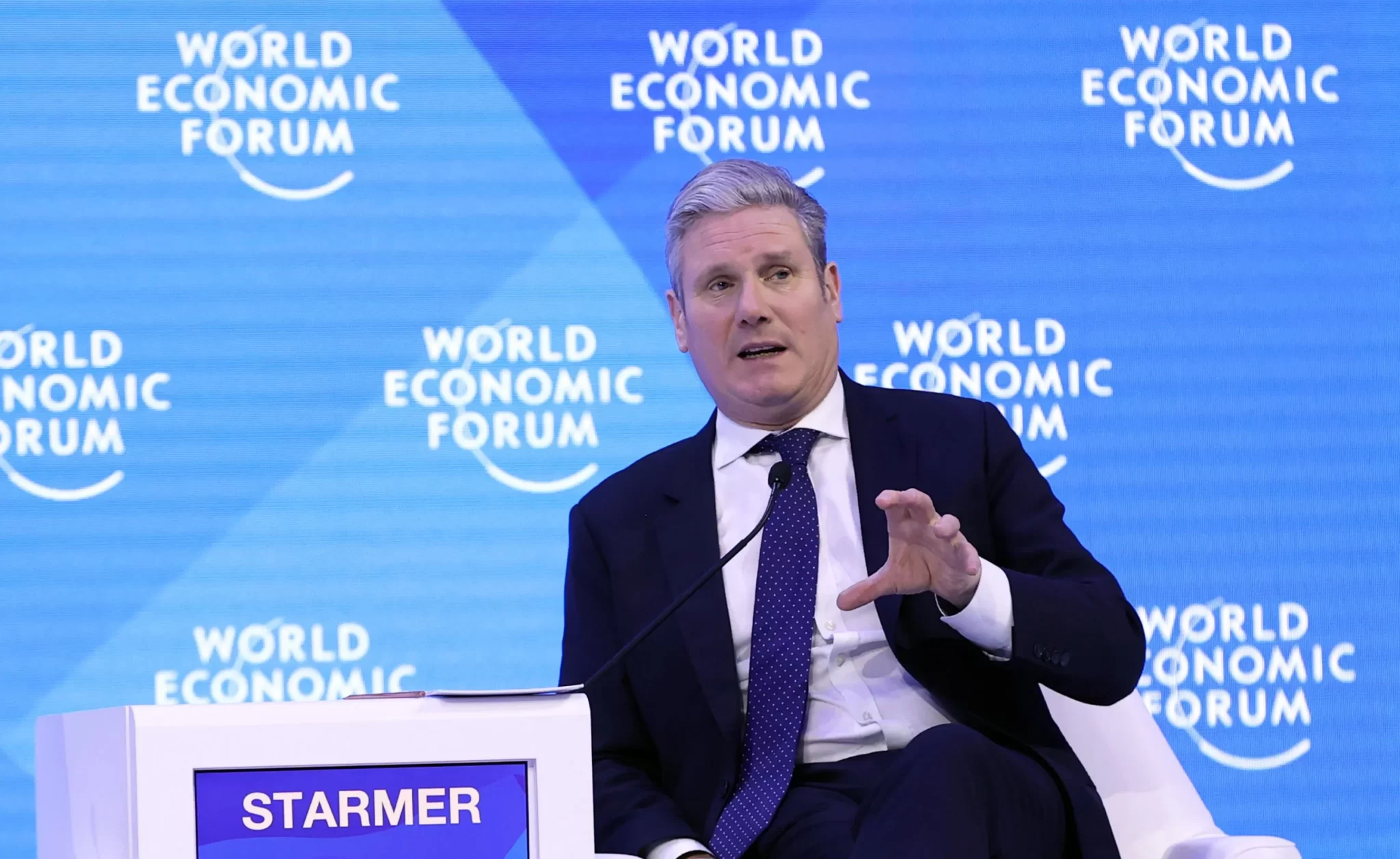 Image of Keir Starmer sucking up to the rich and powerful at the World Economic Forum, Davos